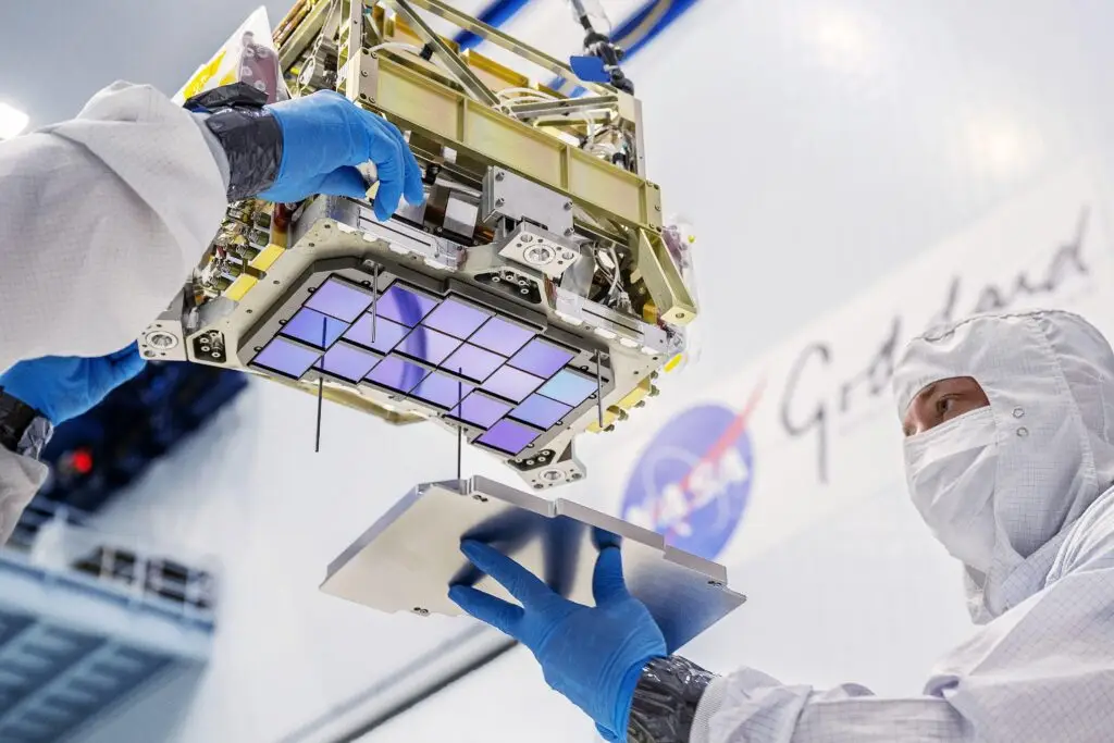 300 million Pixels, NASA, Youngest Science Fleet, Roman Telescope, space astronomy, extremely sensitive imaging systems, NASA’s Nancy Grace Roman Space Telescope, Nancy Grace Roman Space Telescope, Roman Space Telescope, Wide Field Instrument, 300-megapixel camera, Hubble Space Telescope, Roman’s WFI, huge focal plane, infrared detectors, precisely aligned detector mosaic, WFI, wide-field imaging camera, slitless spectrometer, conventional RGB image, Roman's Element Wheel Assembly, prism, grism, slitless spectroscopy, astronomical objects, 300-megapixel camera, rigid focal-plane structure, Alignment Compensation Mechanism, Roman camera, spacecraft, Hubble, wide-field optics, large-format HgCdTe detectors, near-infrared sensitivity, precision spacecraft stability, modern astrophysics, dark energy, dark matter, galaxy evolution, exoplanets, 300-megapixel space camera, Hubble's infrared imaging, NASA science fleet, Hubble WFC3/IR, Webb NIR Cam, Roman WFI